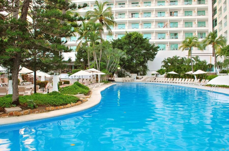فندق إمبوريو أكابولكو المظهر الخارجي الصورة The swimming pool at the Grand Palladium Hotel