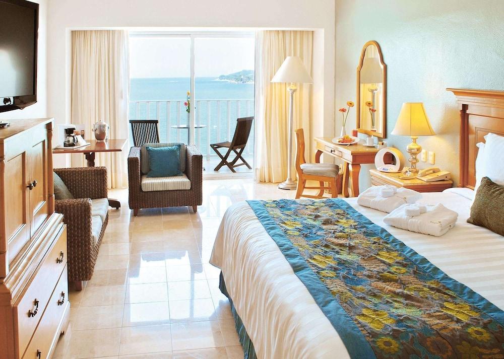 فندق إمبوريو أكابولكو المظهر الخارجي الصورة A typical room at the resort